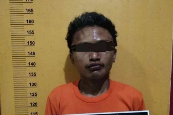 tersangka-riski-saputra